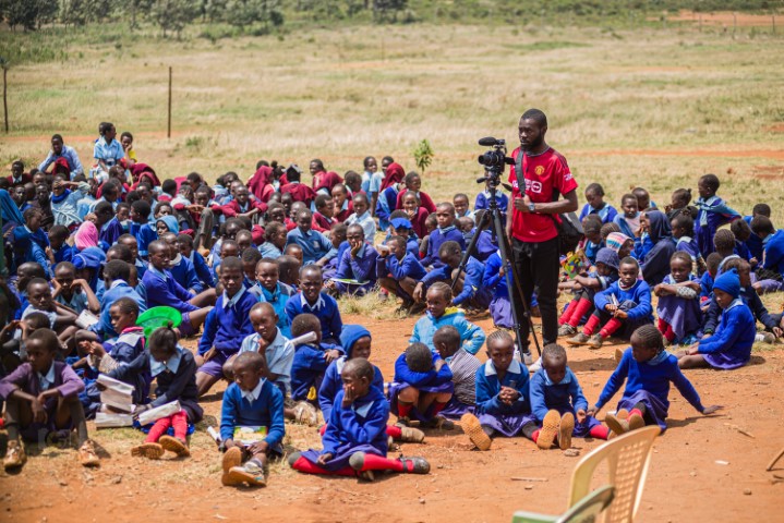 A participant with a camera